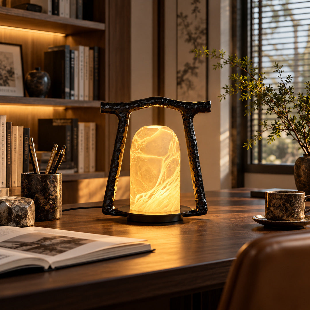 Volta alabaster table lamp adding ambient light to a home office desk