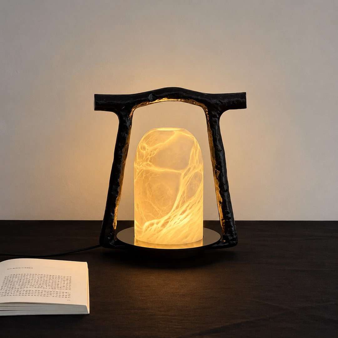 Volta alabaster table lamp adding ambient light to a home office desk