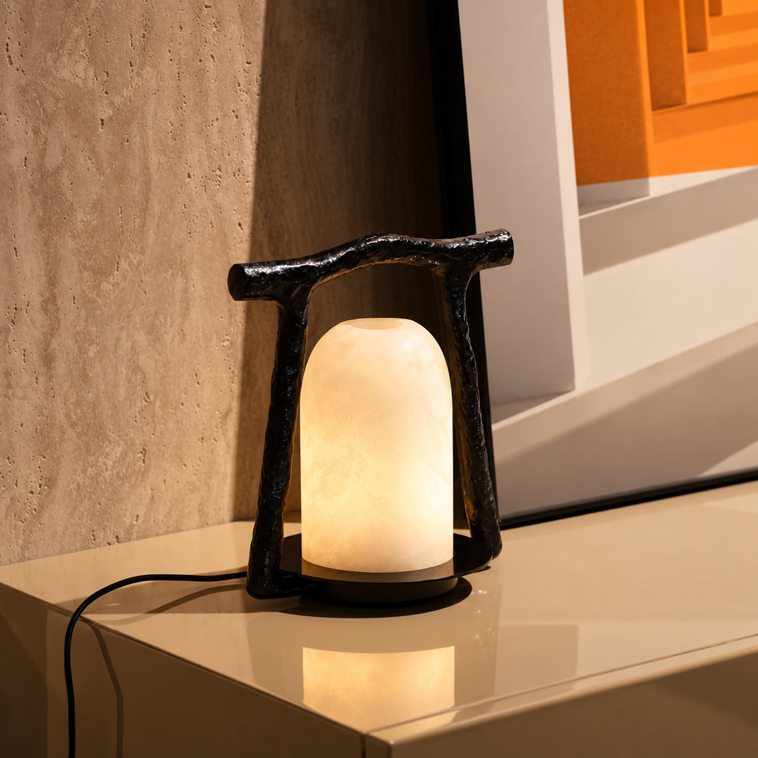 Volta alabaster table lamp as a sculptural accent on an entryway console