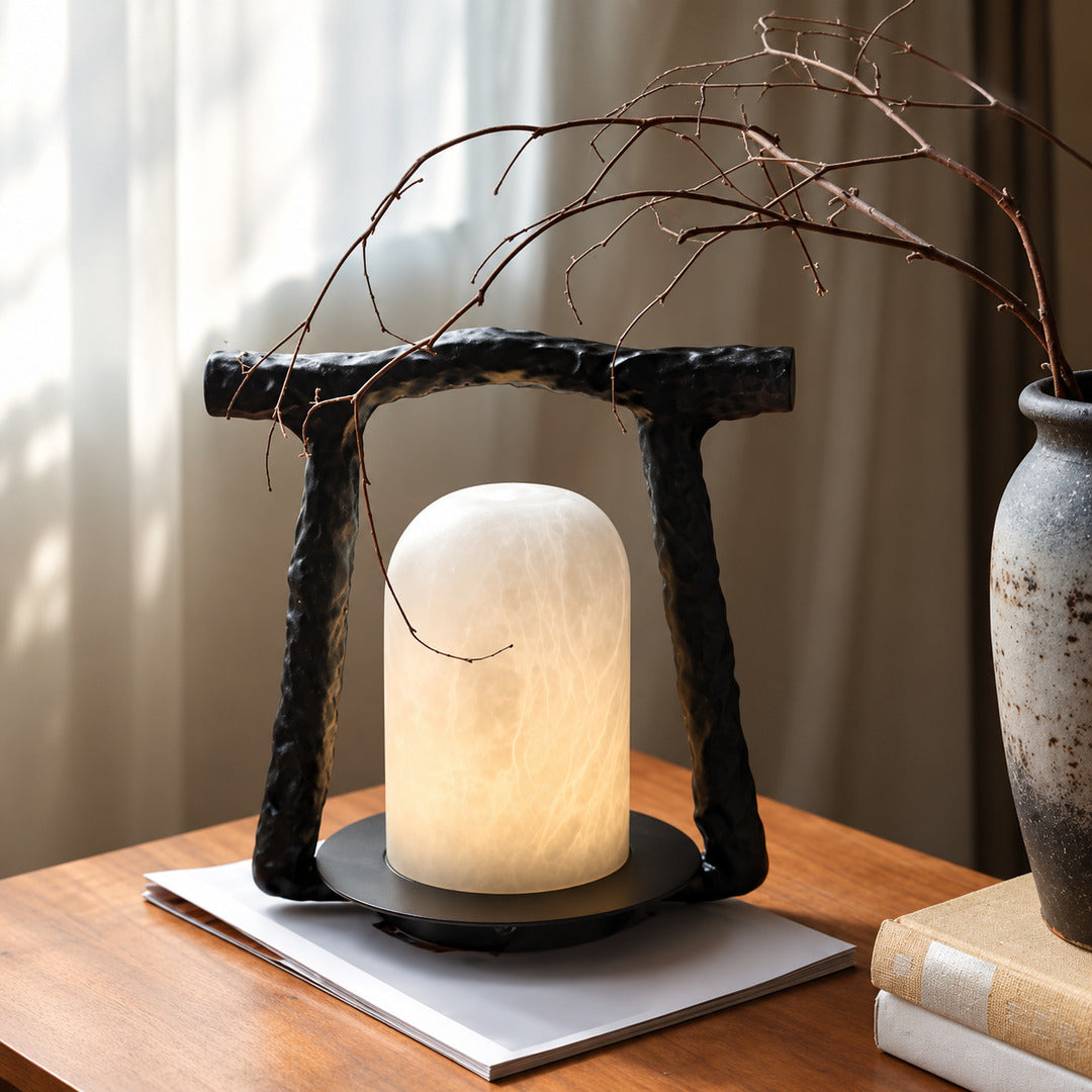 Volta alabaster table lamp adding ambient light to a home office desk