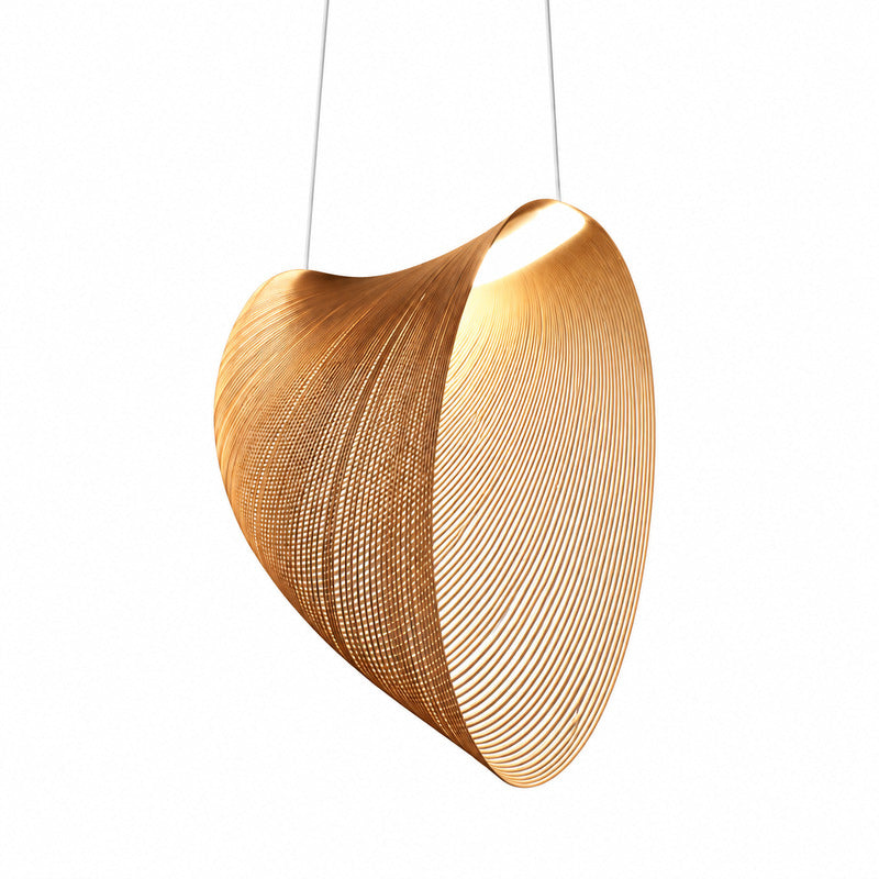 Voluta wood pendant light with a sculptural bent-wood form glowing warm over a dining table