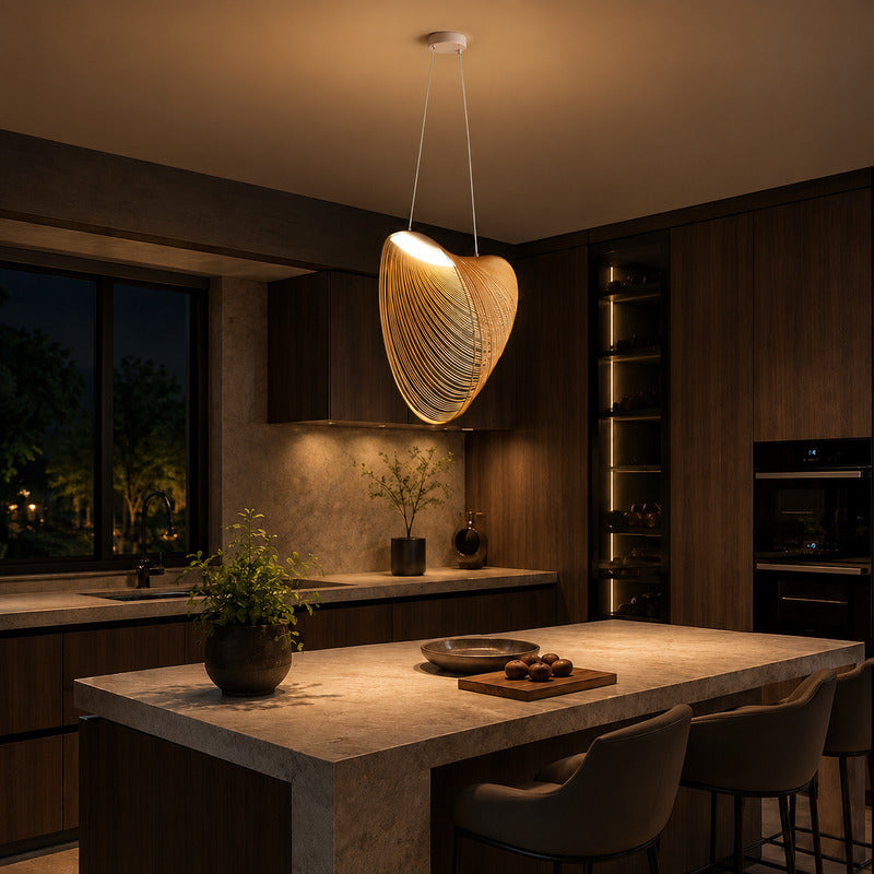 Voluta bent-wood pendant light suspended over a modern kitchen island