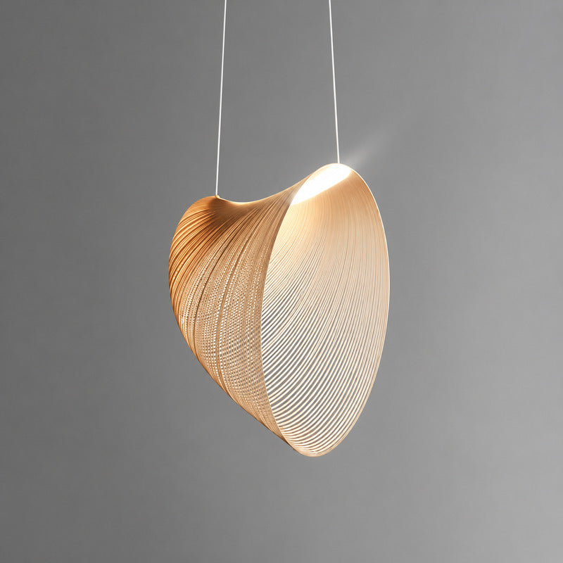 Medium 23.6-inch Voluta bent-wood pendant light centered above a dining table