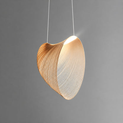 Medium 23.6-inch Voluta bent-wood pendant light centered above a dining table