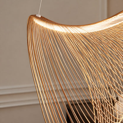 Soft diffused warm glow from the acrylic diffuser inside the Voluta wood pendant light