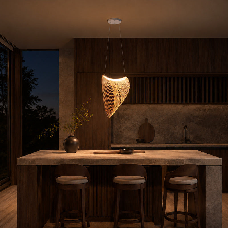 Voluta bent-wood pendant light suspended over a modern kitchen island