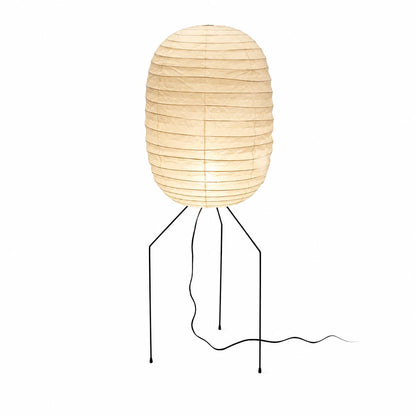 Studio portrait of the illuminated capsule Washi Paper UF3-DL Floor Lamp with black metal legs against white backdrop by Stuber Lighting.