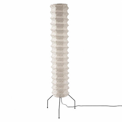 Clean studio shot of the unlit layered cylindrical shade of a Washi Paper UF4-31N Floor Lamp on a white backdrop by Stuber Lighting.