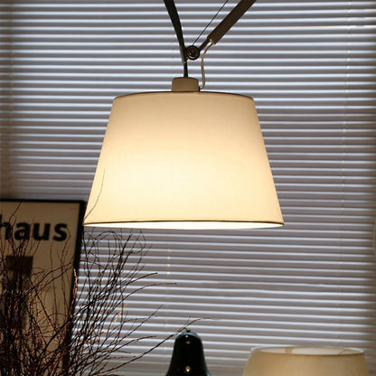 Wren parchment paper shade close up warm amber glow translucent material visible filament library evening light