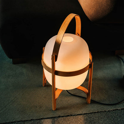 Wynne portable lantern outdoor patio dinner table evening cordless Mid Century modern warm glow alfresco dining lifestyle interior