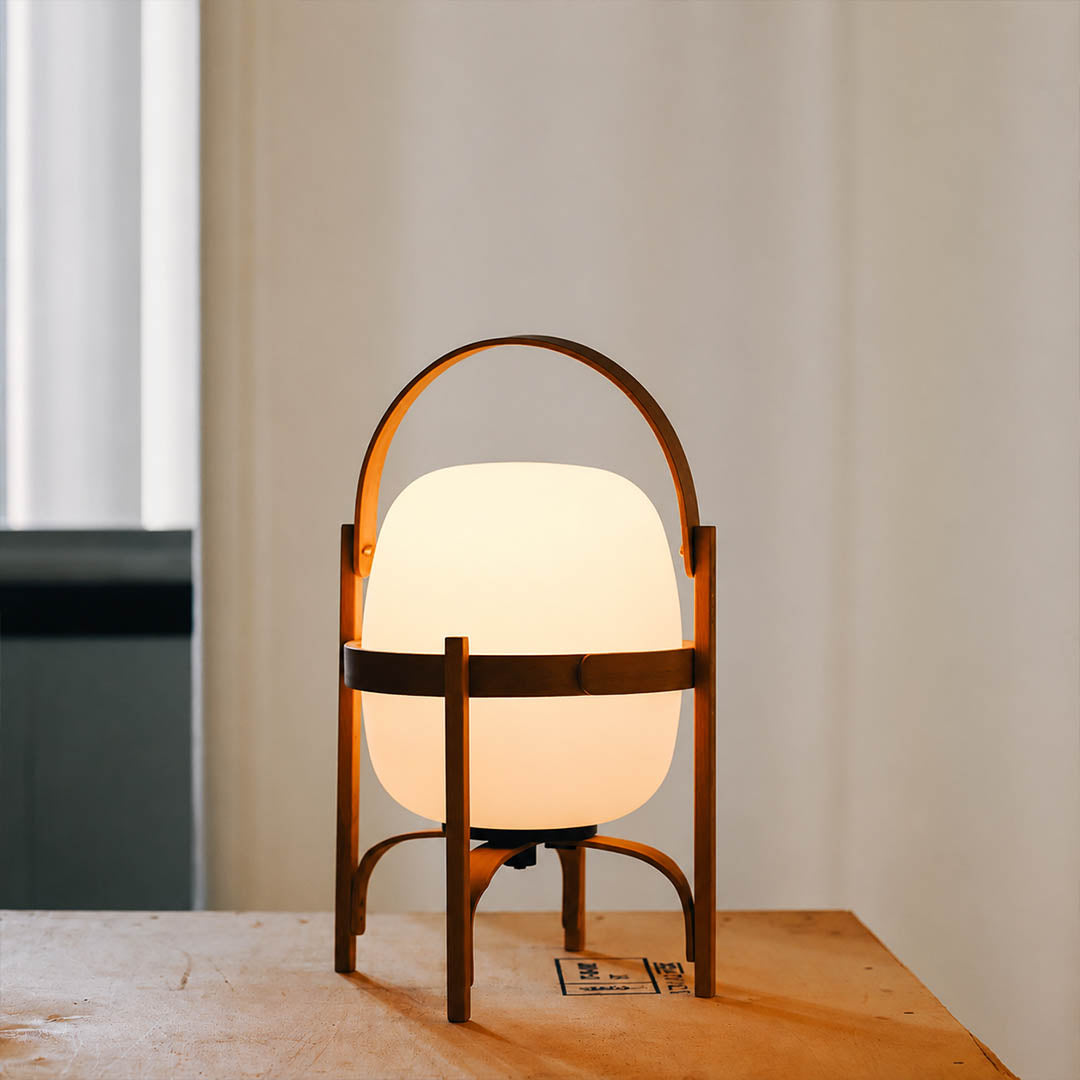 Wynne portable lantern outdoor patio dinner table evening cordless Mid Century modern warm glow alfresco dining lifestyle interior