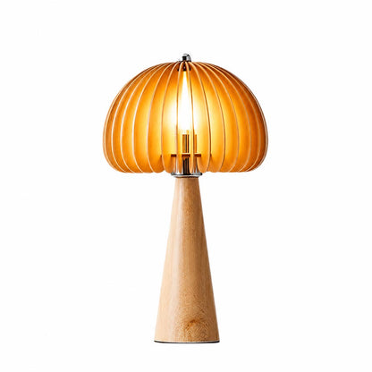 Zucca wood slat table lamp illuminated warm glow through natural wood slats pumpkin shade cozy bedside white background front view